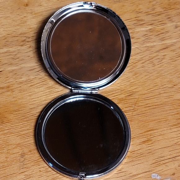 Compact, Stainless Steel, with Luminescent Background behind Design. 2" Diameter - Picture 5 of 7